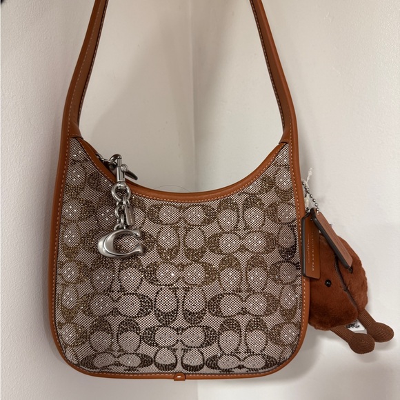 Coach Handbags - Coach Crystal Curve Zip NWT